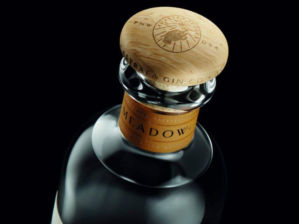 A bottle of wine with a wooden stopper, perfect for any place or time.