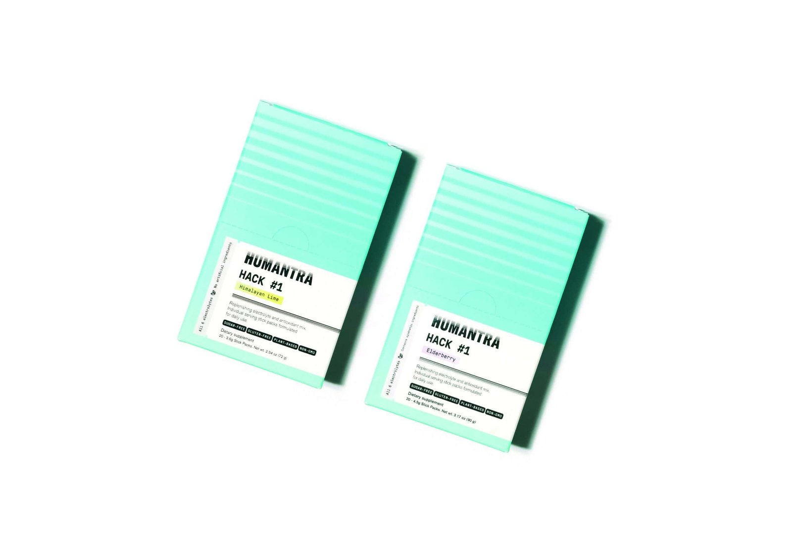 Just two mint colored notebooks on a white background.