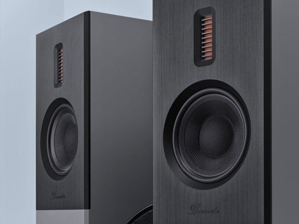 A pair of speakers breaking sound barriers as they sit next to each other.
