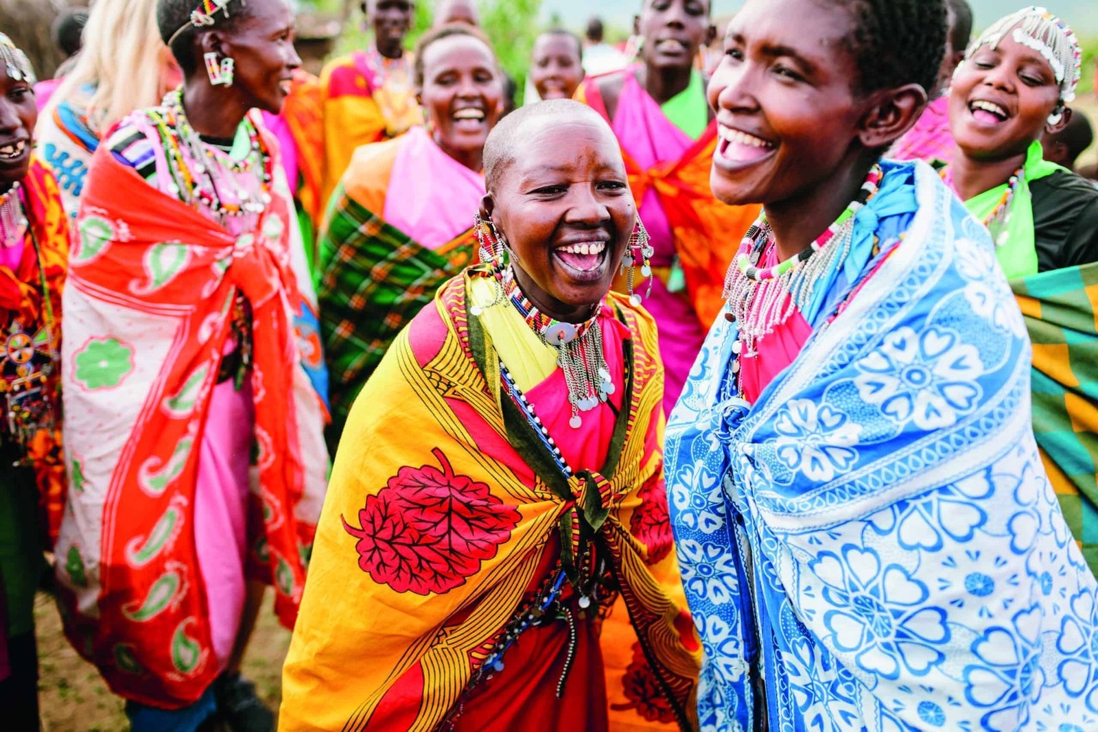 A group of wild women dressed in colorful cloths.