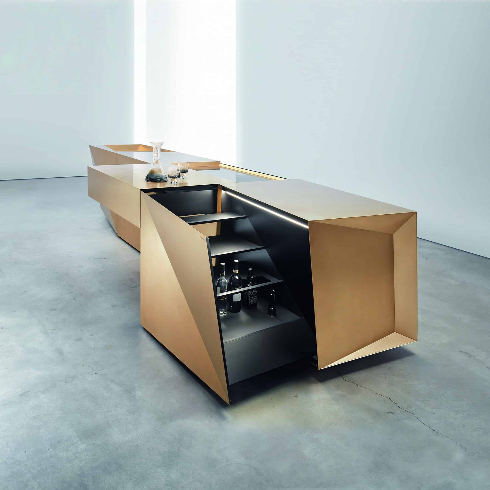 A modern kitchen with a wooden counter top that combines form and function.